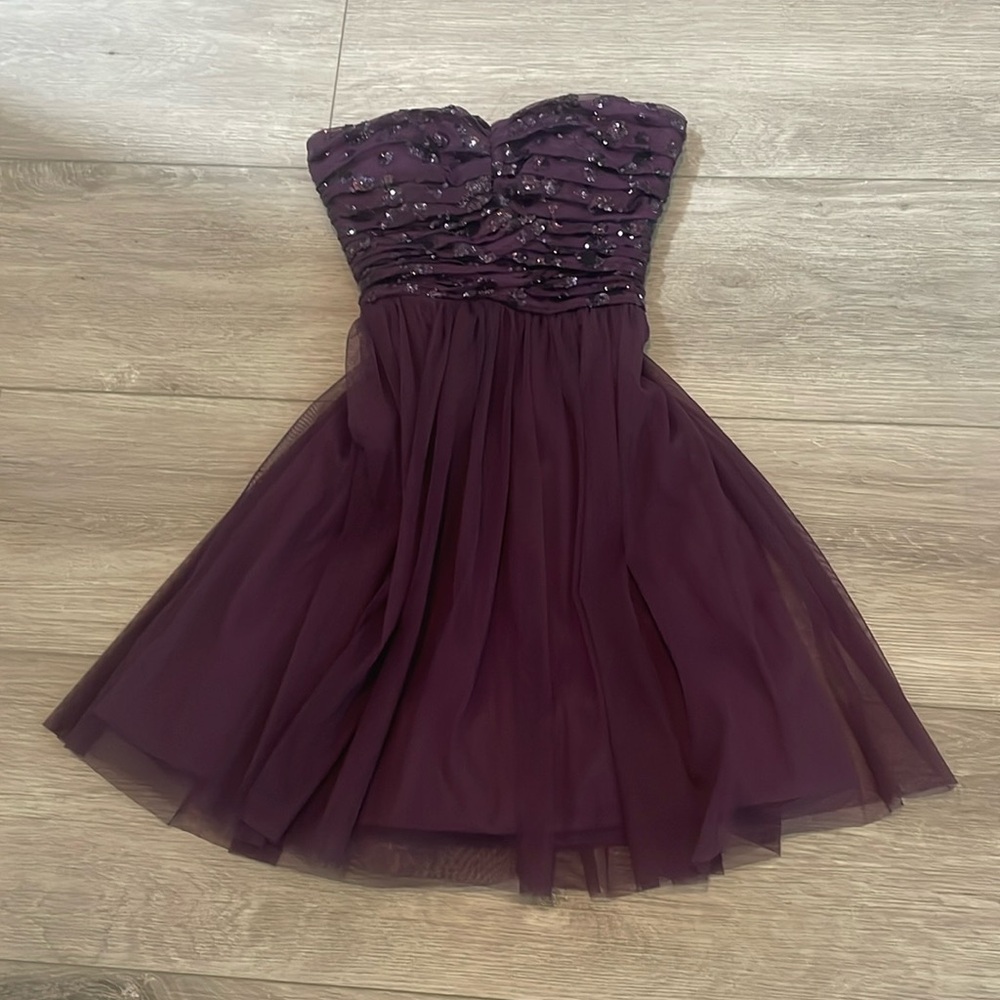 Dark purple and strapless Delia’s dress
